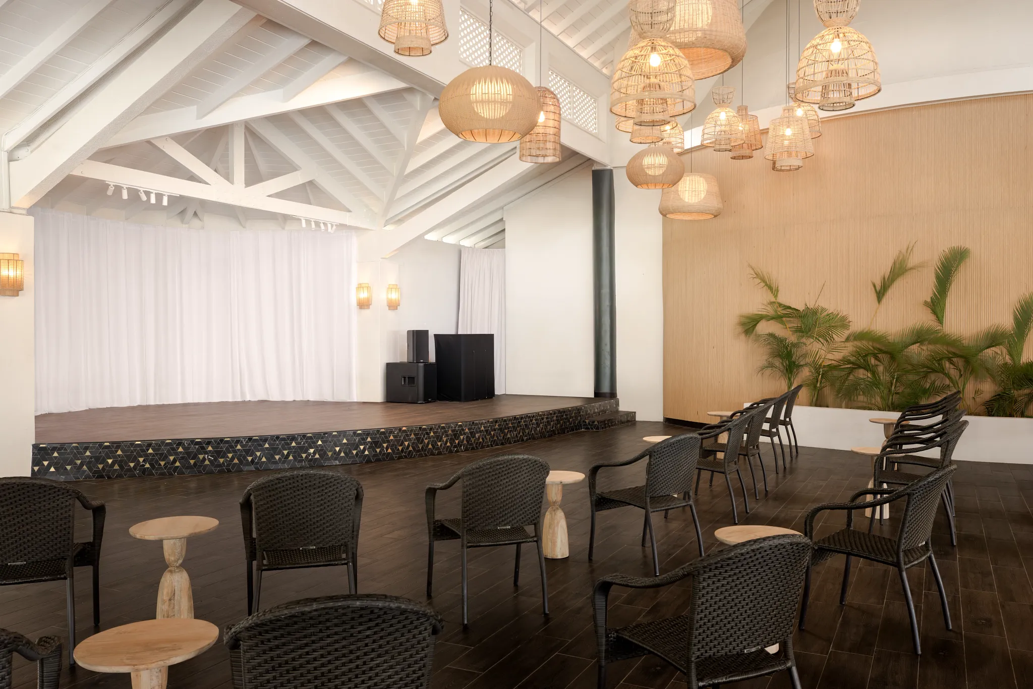 Indoor theater seating and stage area at Secrets St. Lucia Resort & Spa.