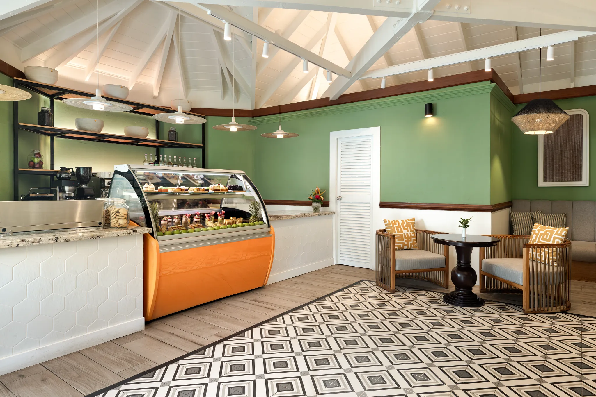 Coco Café at Secrets St. Lucia Resort & Spa featuring a cozy coffee bar serving premium espresso drinks and light snacks in a relaxed indoor setting.