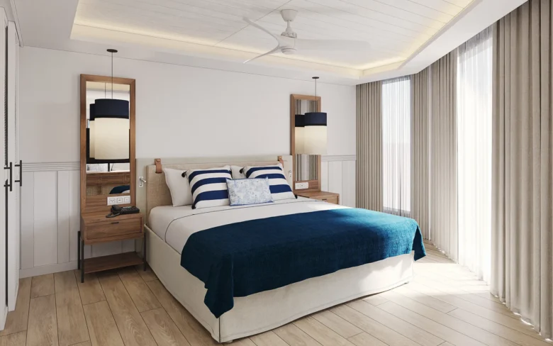 Deluxe Tropical View king room with floor-to-ceiling windows and private balcony at Secrets St. Lucia Resort & Spa.