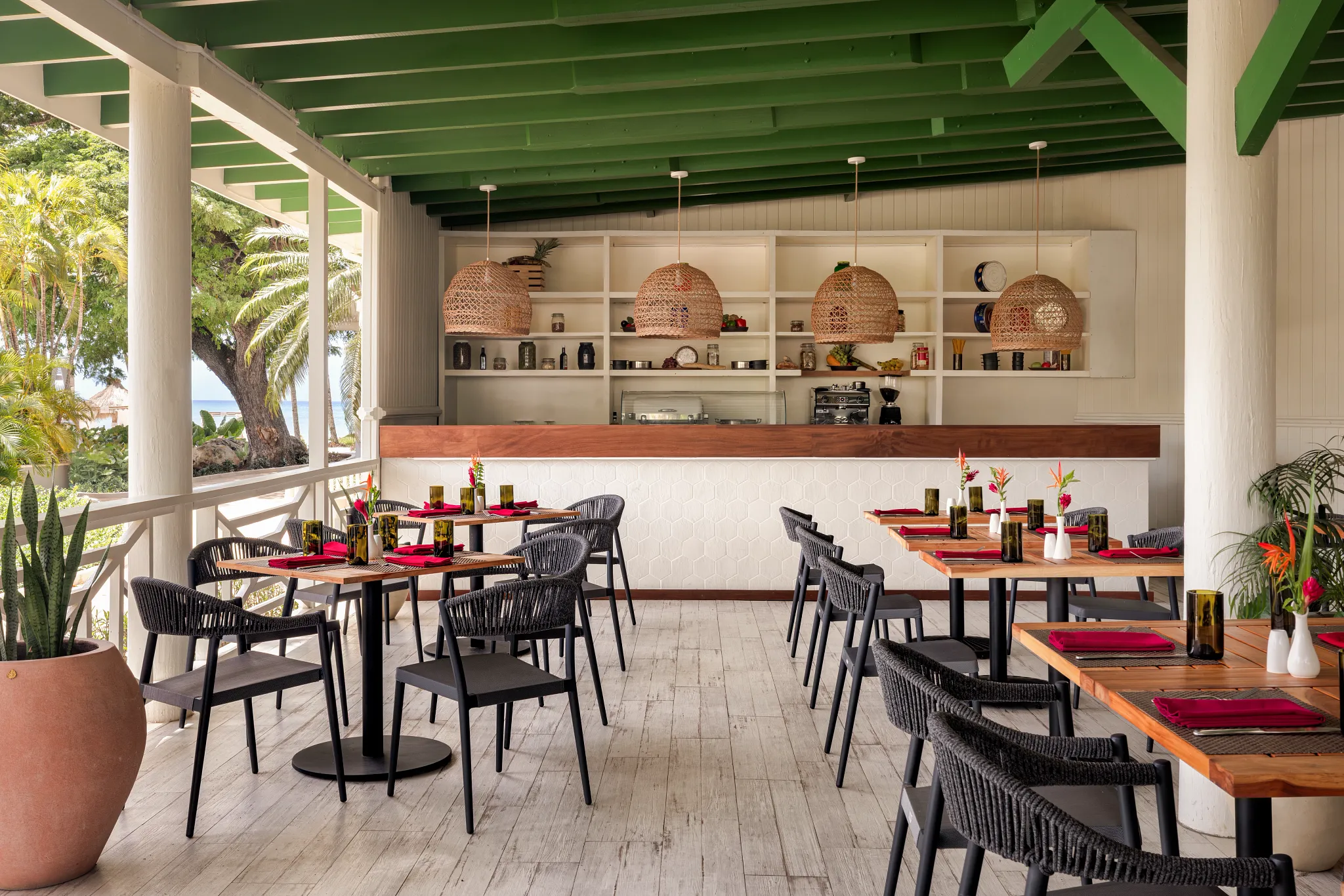 Le Petit pastry shop at Secrets St. Lucia Resort & Spa featuring a charming café-style setting with fresh French pastries and desserts.