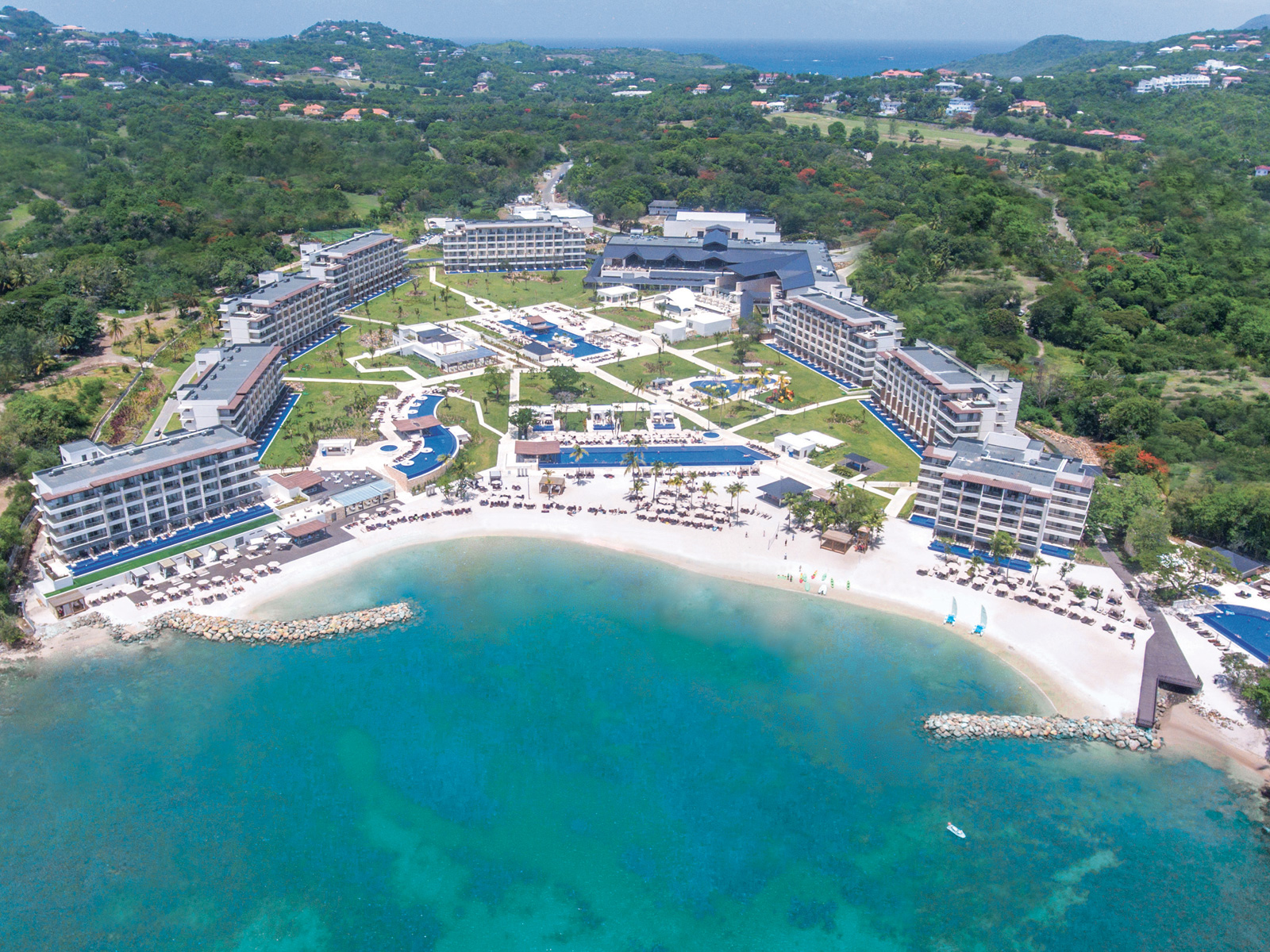 Royalton Saint Lucia Resort and Spa all-inclusive beachfront resort with family pools, water park, and modern Caribbean accommodations.