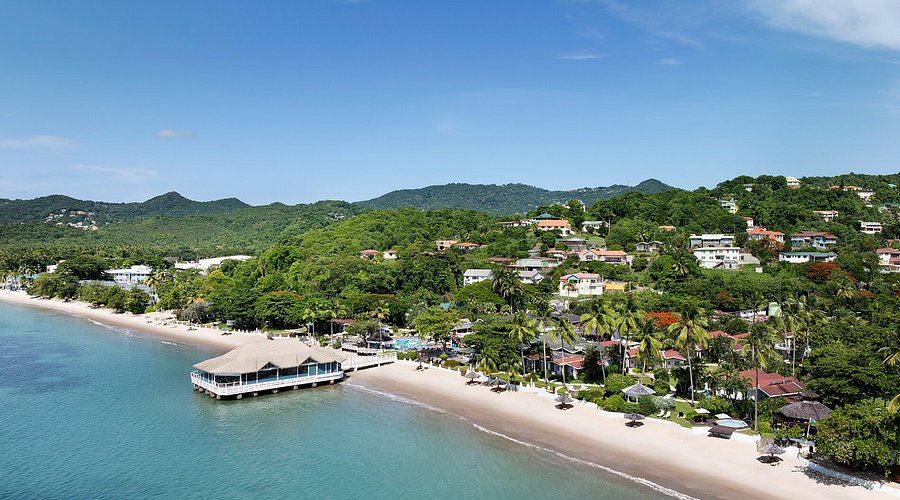 Sandals Halcyon Beach adults-only couples all-inclusive resort in St. Lucia with calm beach, intimate garden setting, and Caribbean charm.