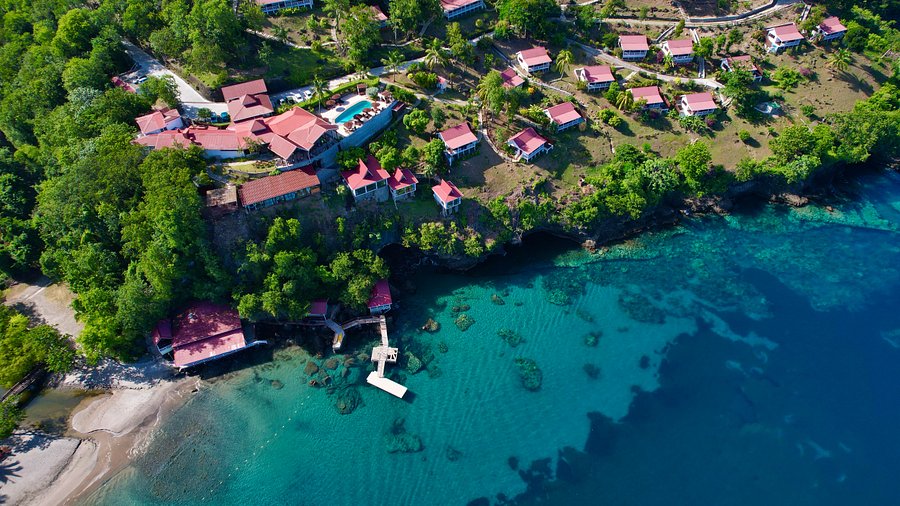 Ti Kaye Resort and Spa St. Lucia boutique cliffside resort with secluded beach, romantic cottages, and Caribbean Sea views.