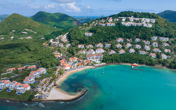 Windjammer Landing Resort and Residences St. Lucia hillside villas with Caribbean views, multiple pools, and family-friendly amenities.
